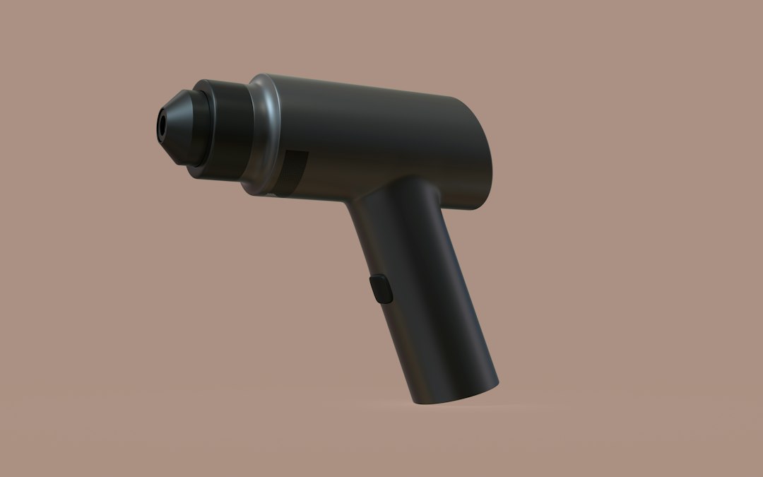 Modern handheld massage gun with attachments for foam roller vs massage gun guide