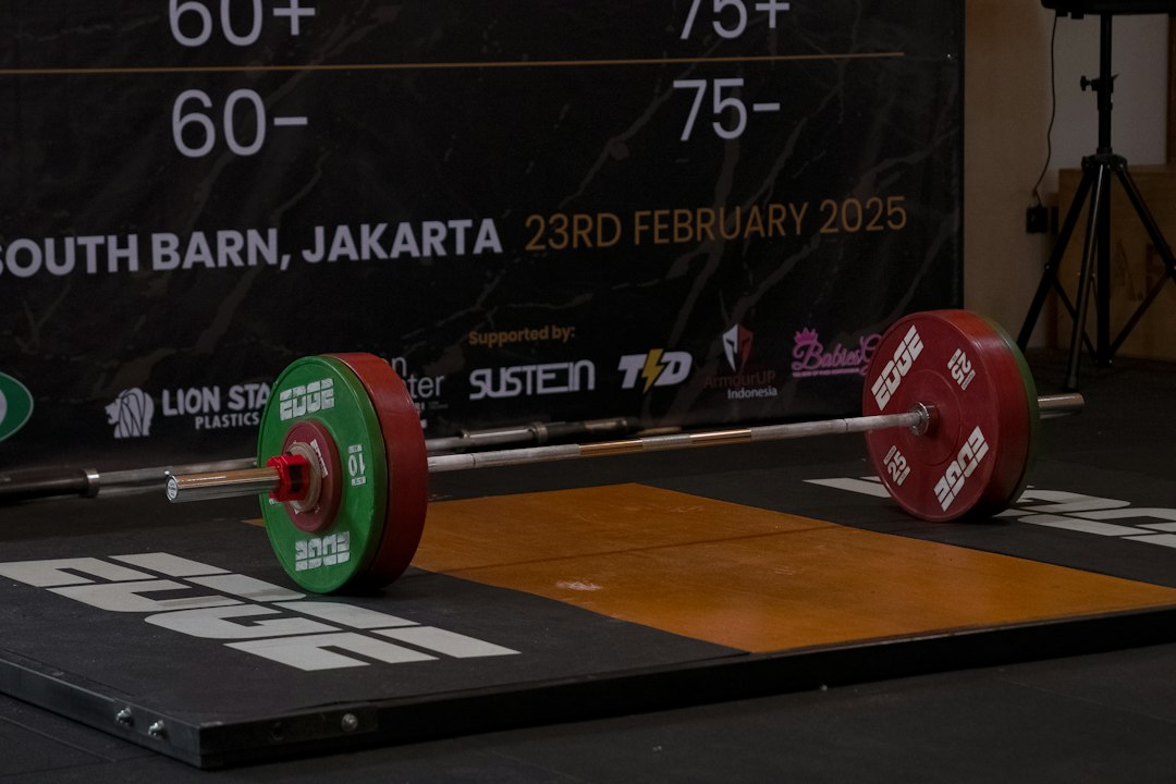 Close-up detail of layered plywood and rubber deadlift platform construction.